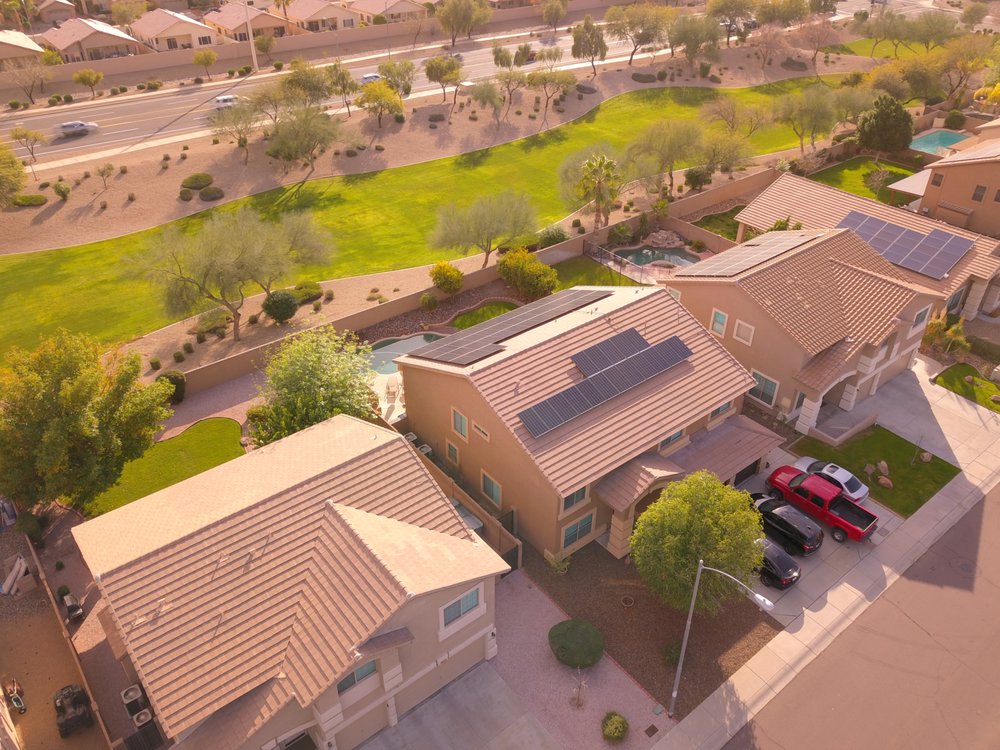 Aerial view of Arizona homes with rooftop solar panels installed by Ultra Energy